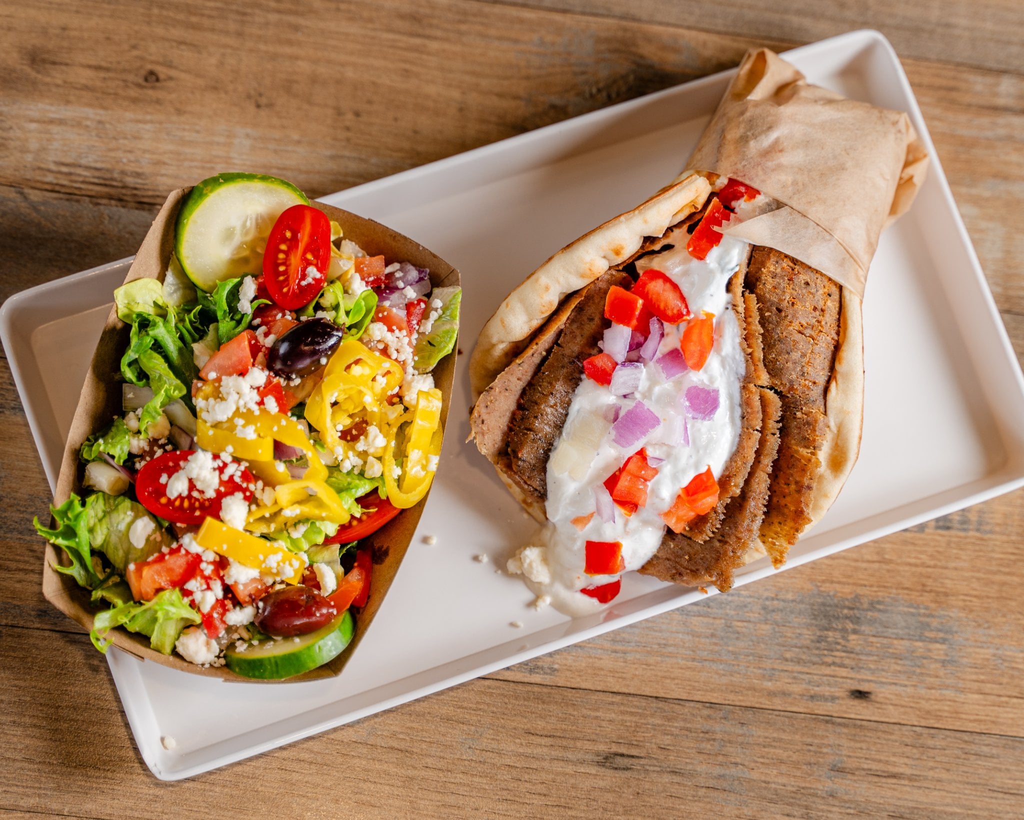 Gyro Greek plate with carved beef and lamb, pita, and tzatziki