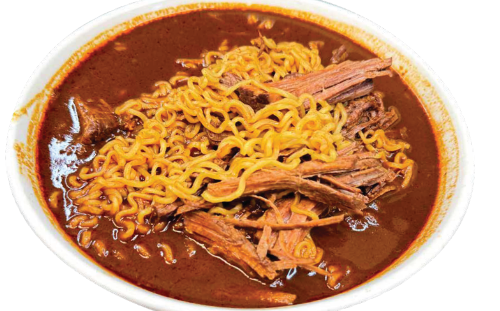 Birria Ramen with shredded birria meat in savory broth