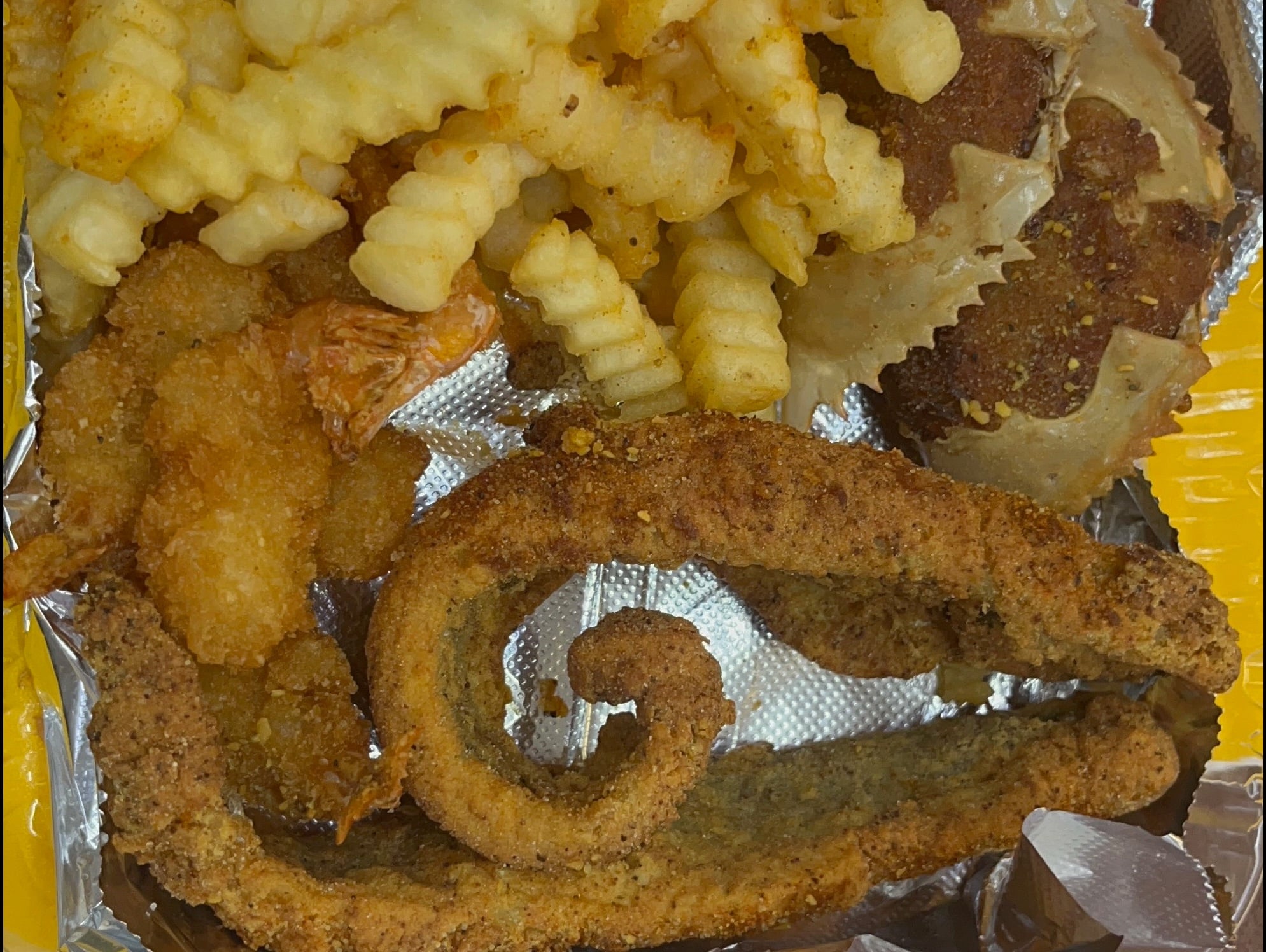 Seafood Platter with fish, shrimp, stuffed crabs, fries and coleslaw