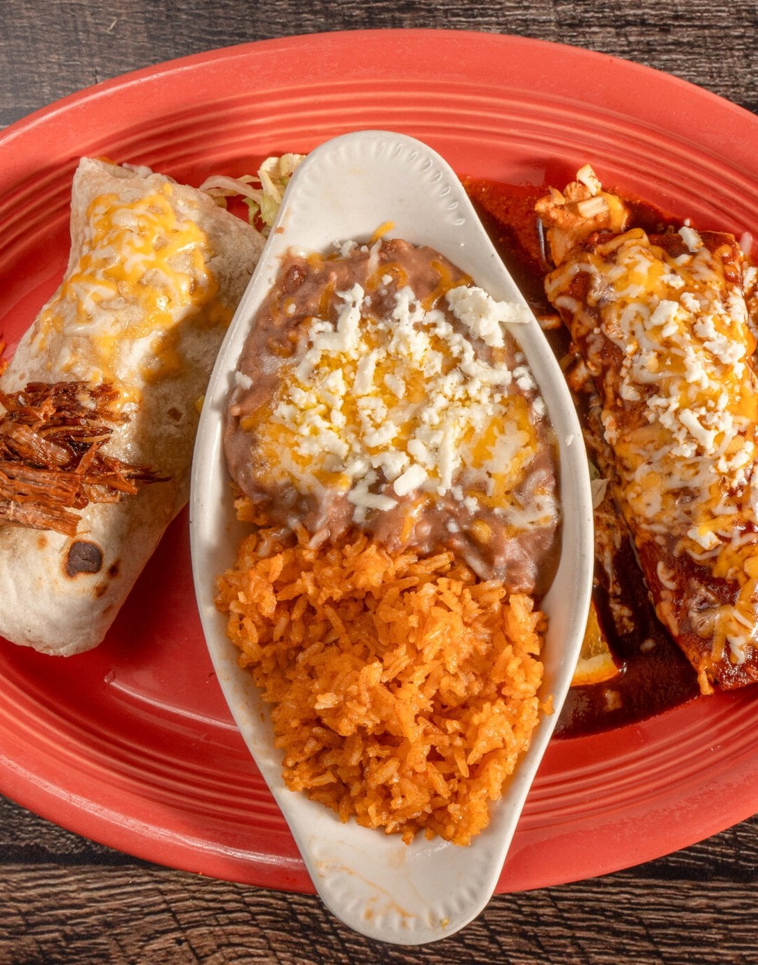 Mix Burrito filled with fresh ingredients and topped with salsa