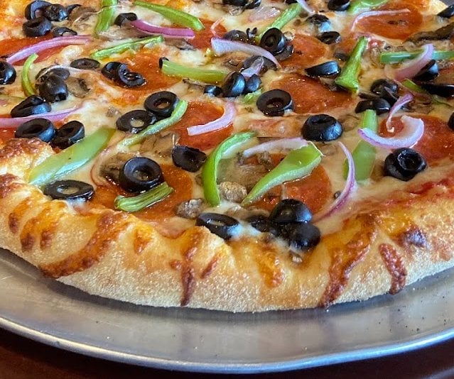 Freshly prepared pizza from Redpoint Inn Restaurant