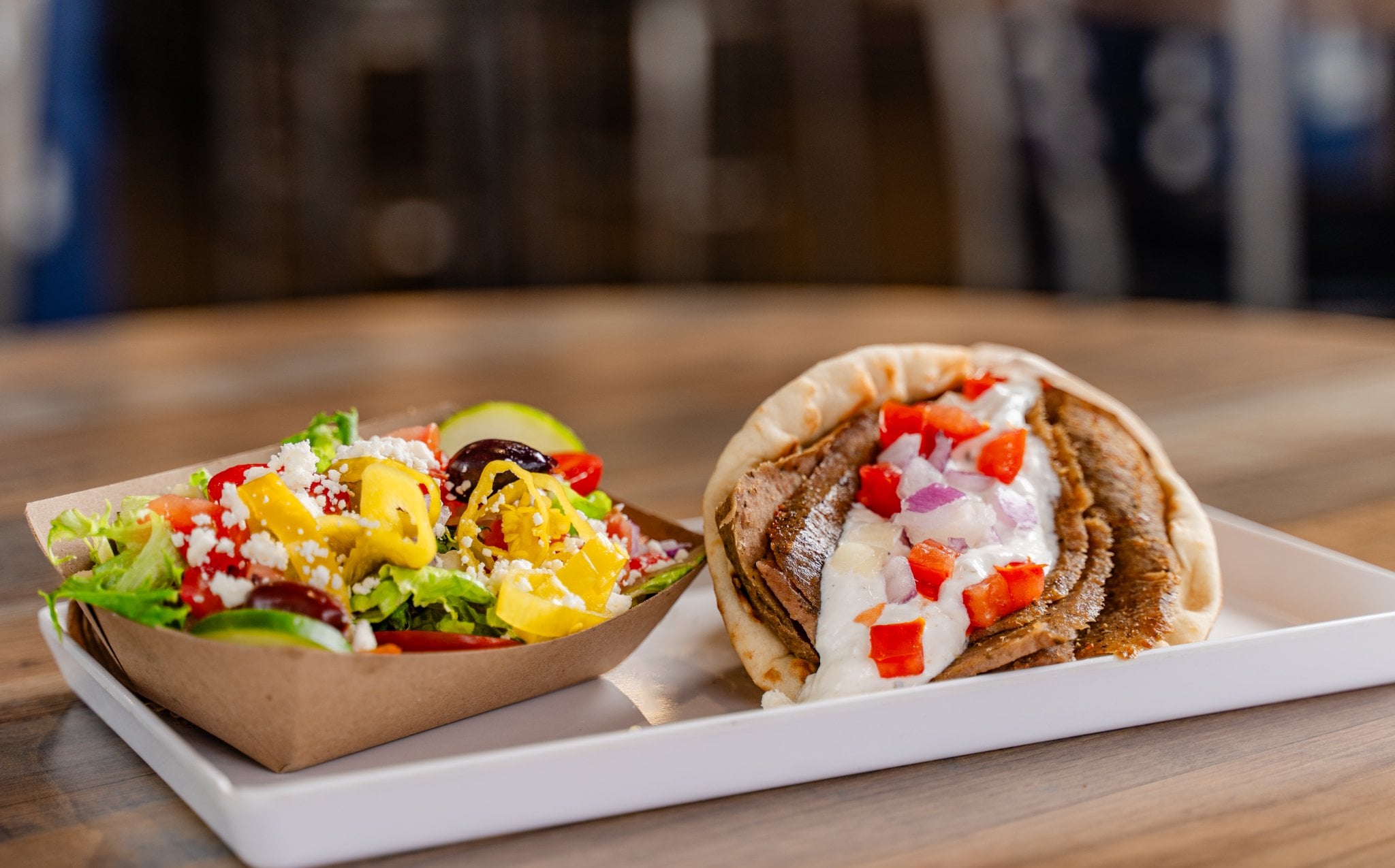 Gyro Greek Plate with carved meat, pita, tomatoes and onions