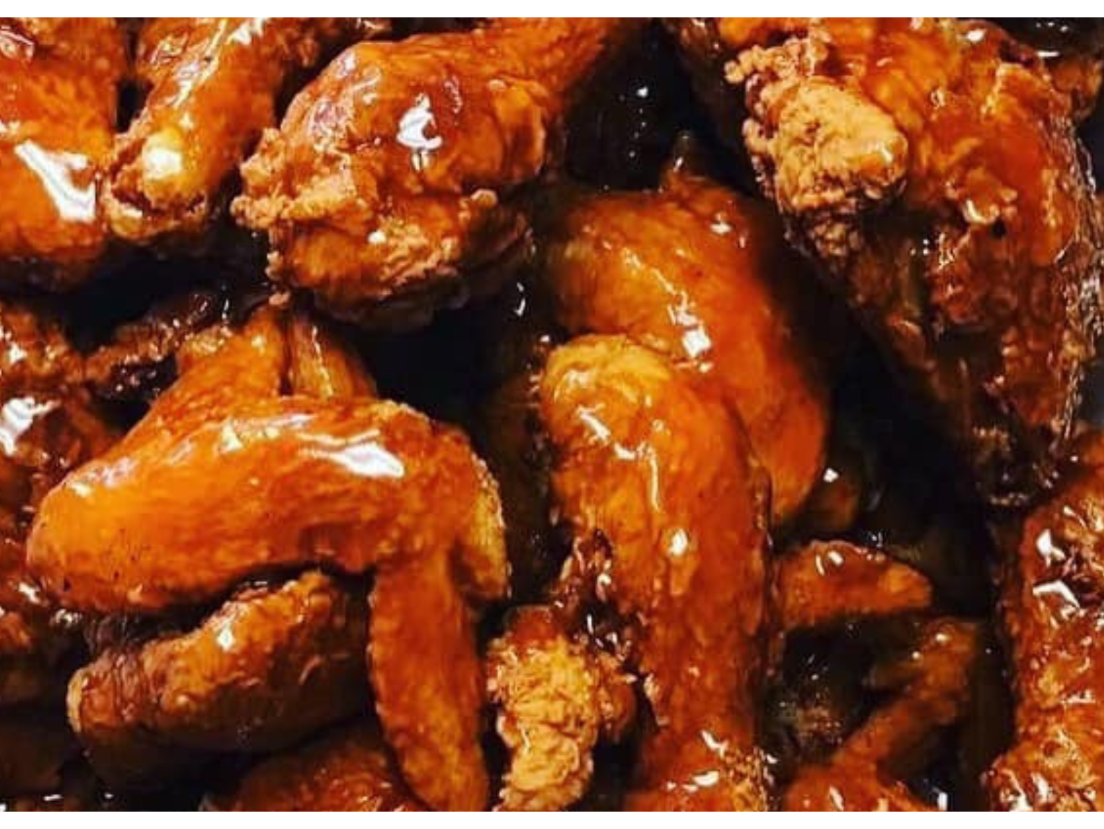 50 piece mixed chicken order with legs, thighs, and wings
