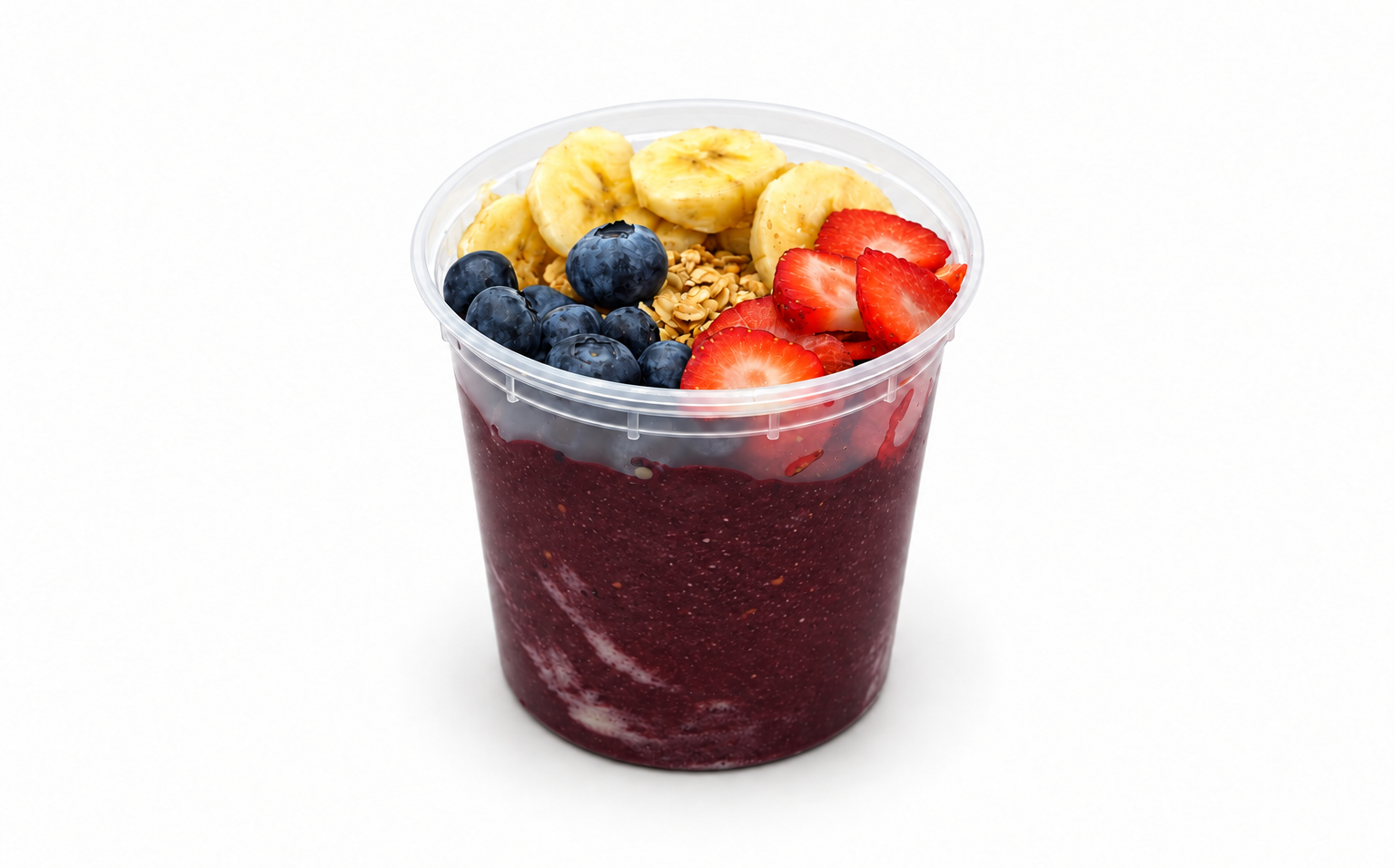 Acai bowl topped with banana, strawberries and granola
