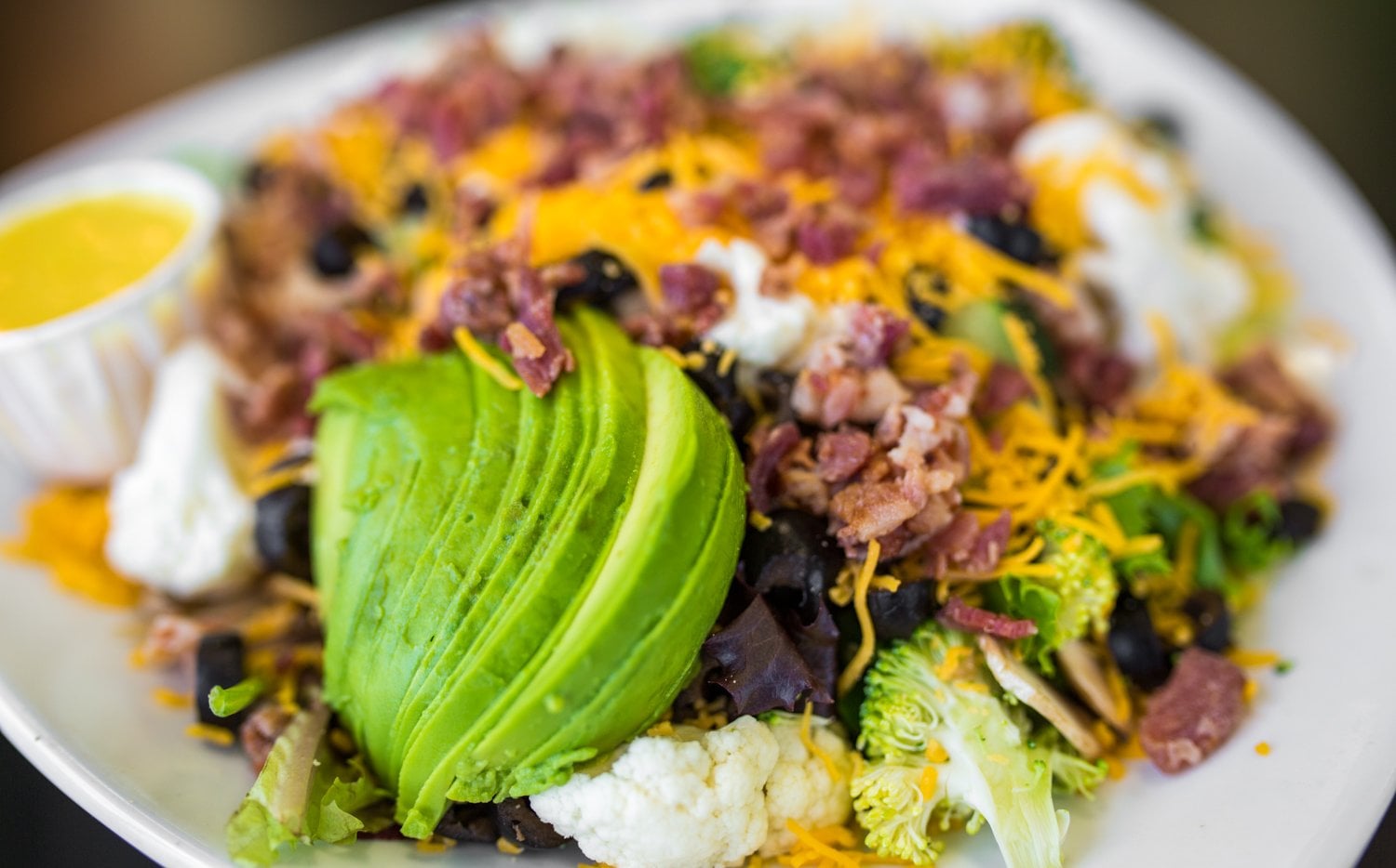 Lettuce Toss It Your Way salad served with Greek pita bread