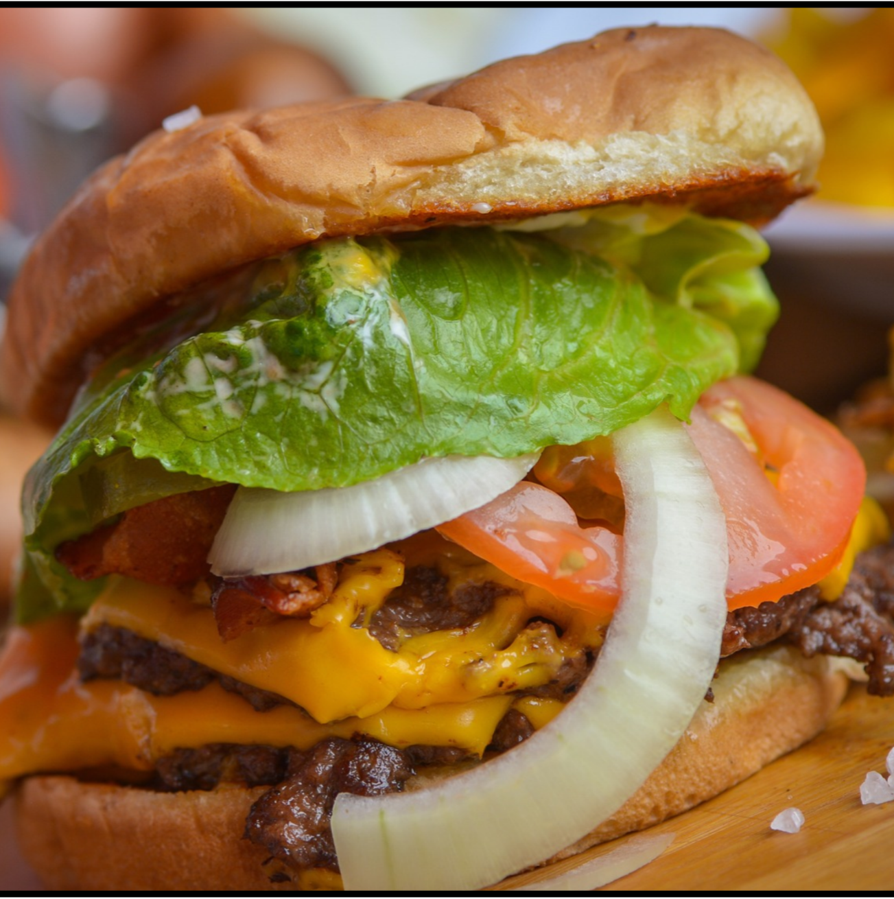 Fresh smash burger loaded with cheese from Ol' Pot Hole