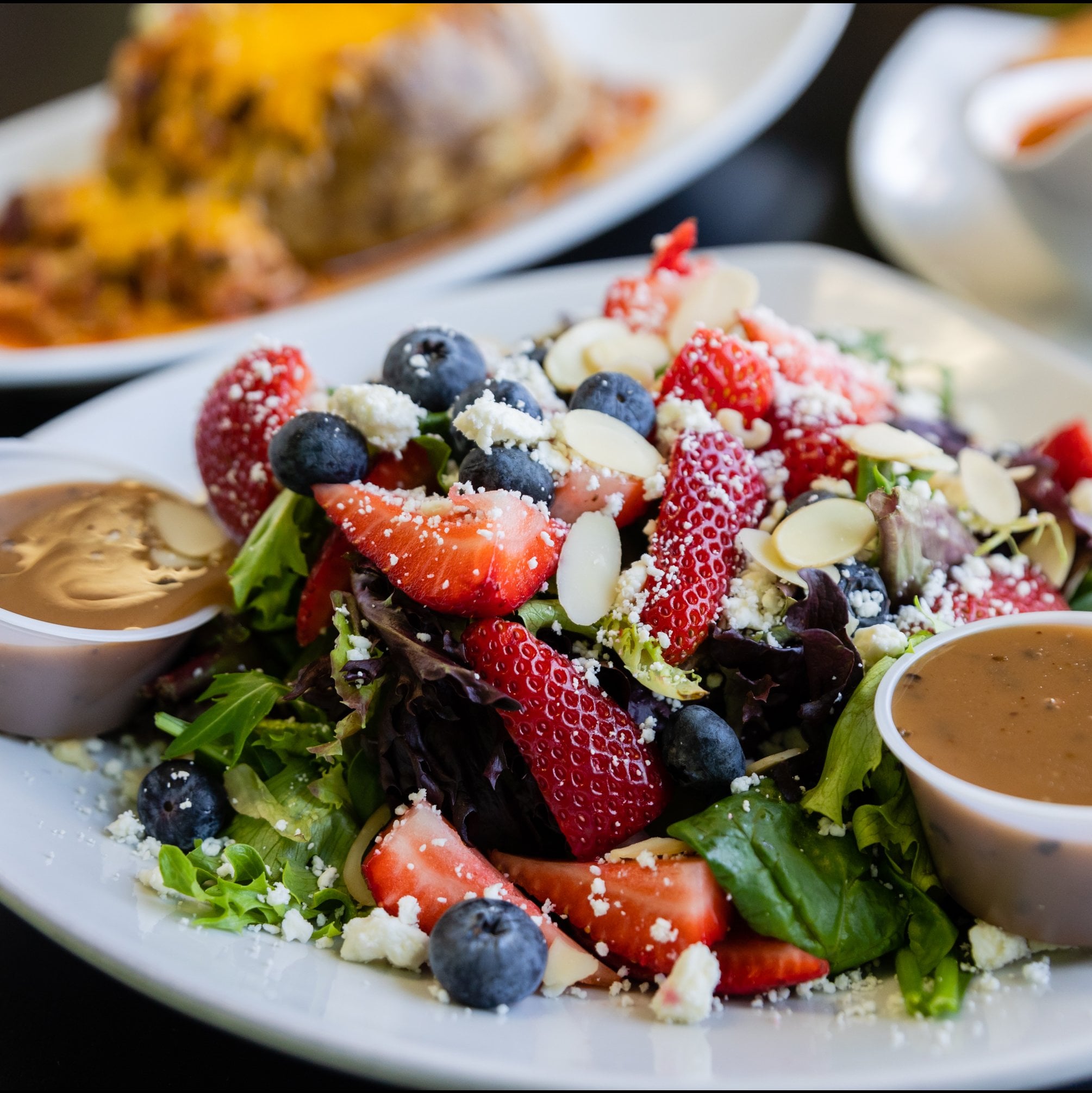 Custom tossed salad served with Greek pita bread