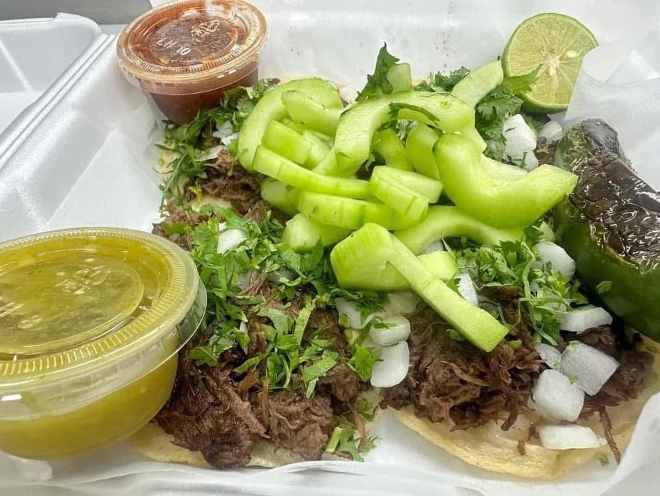 Street-style tacos with meat, onions and cilantro