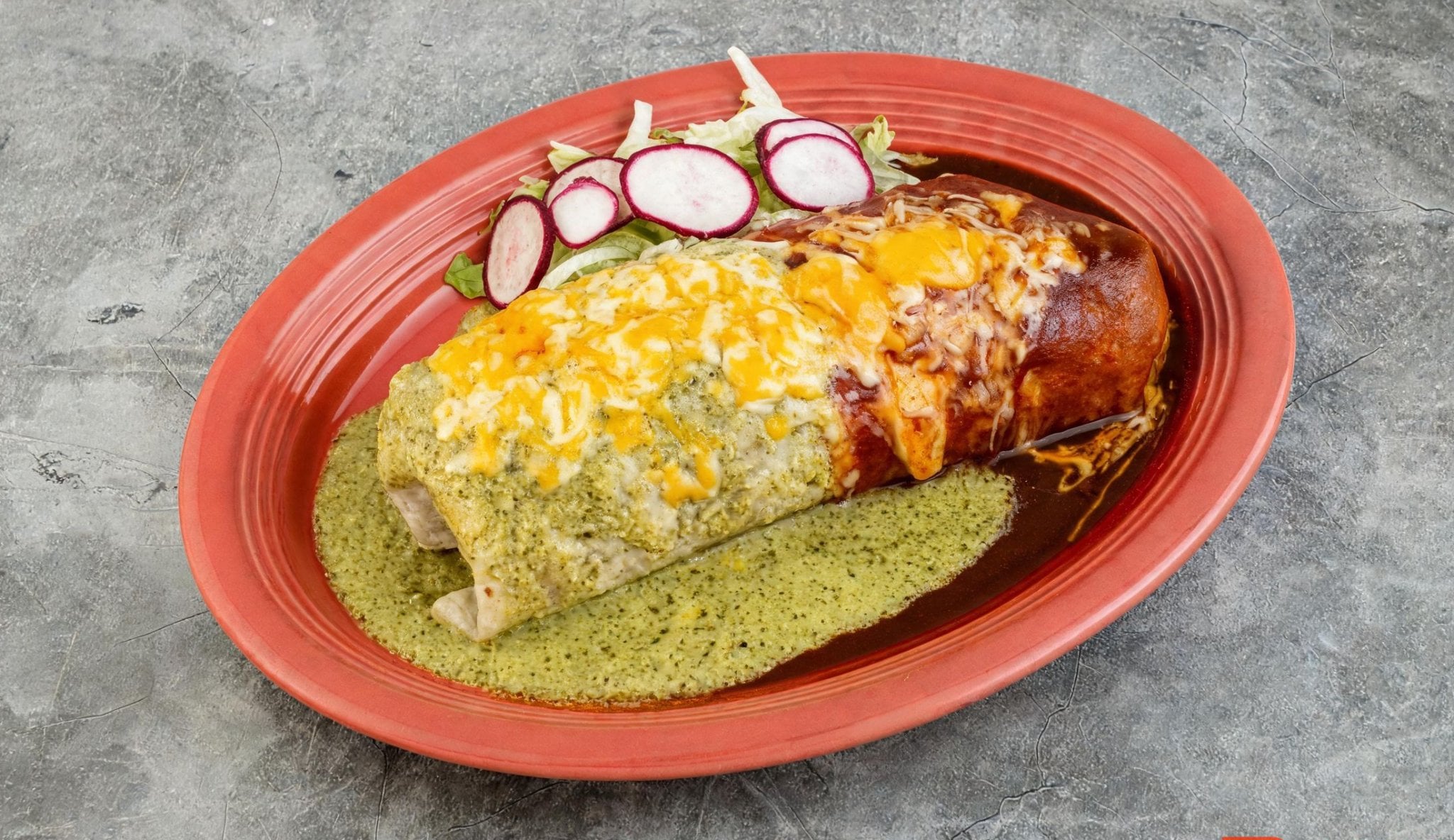 Mega Wet Burrito smothered in enchilada sauce and melted cheese