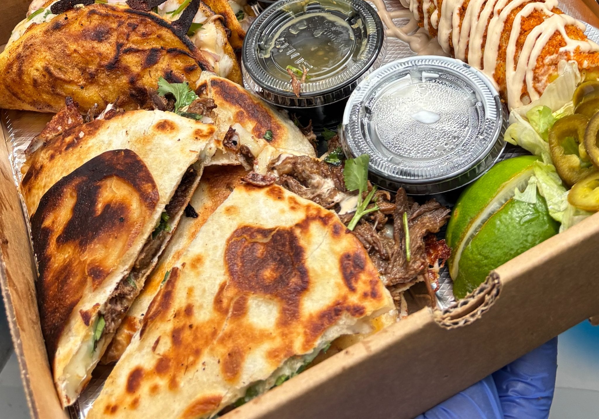 Quesadilla box with spinach dip and chips