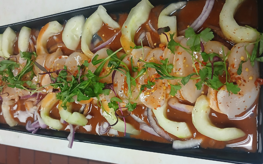 Ceviche de Camaron with lime cured shrimp cucumber cilantro and avocado